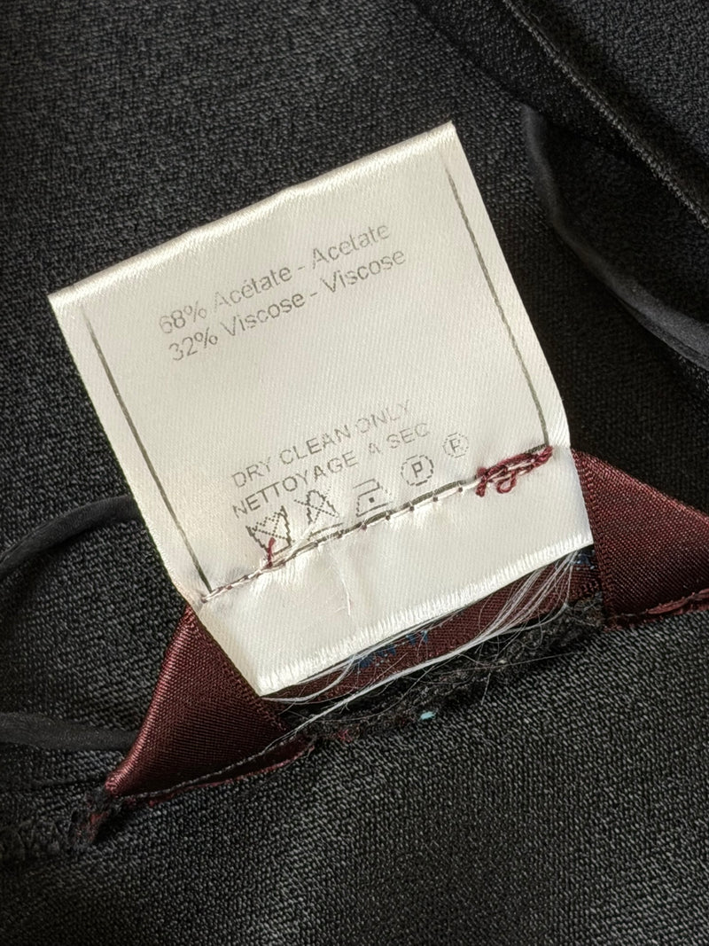 Black satin slip dress by John Galliano, seam and fabric detail