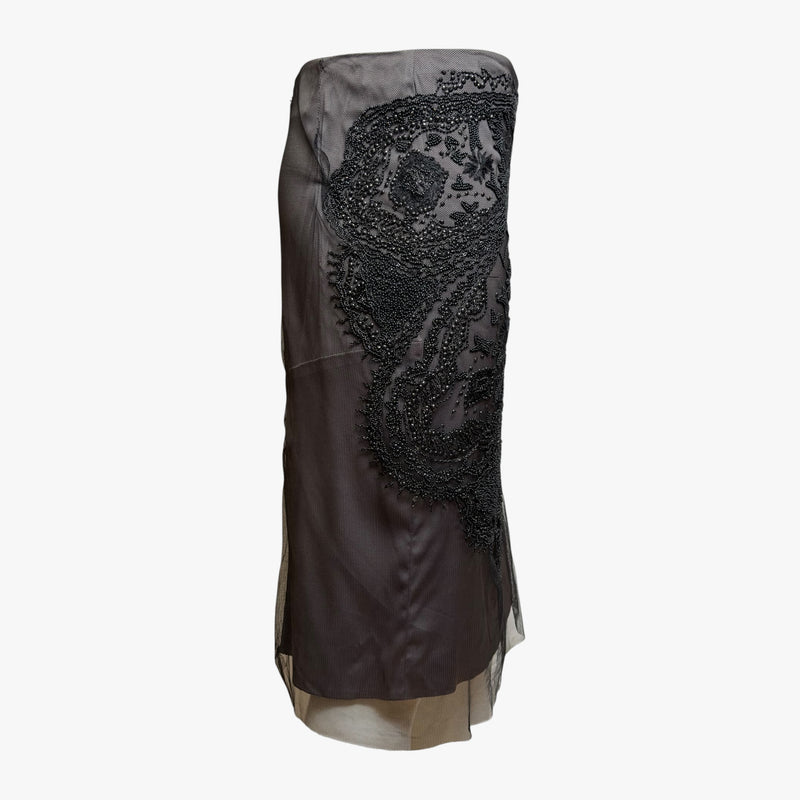 Charcoal grey beaded mesh pencil skirt by Gucci, close-up of baroque-inspired black beading