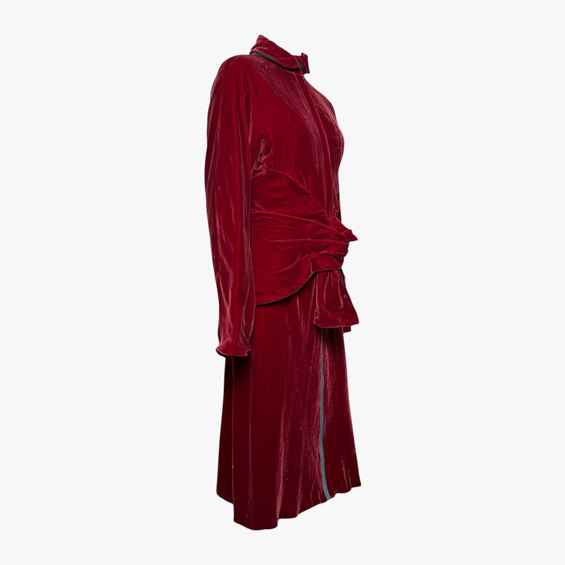 Burgundy velvet dress by Jean Paul Gaultier with plunging V-neckline and sculptural knotted bow