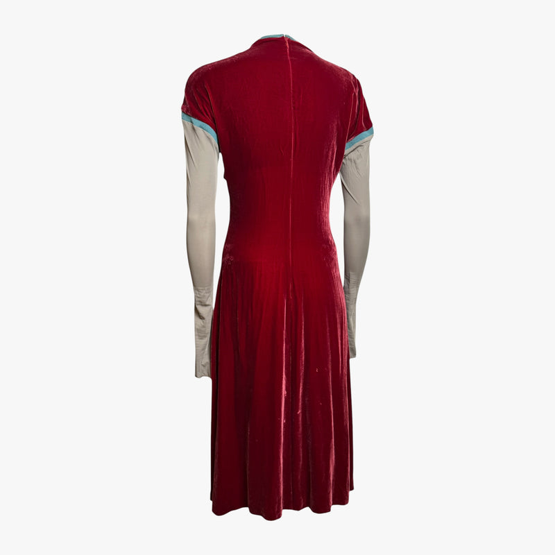Full ensemble lay flat showing burgundy velvet dress and jacket with sage knit colorblock