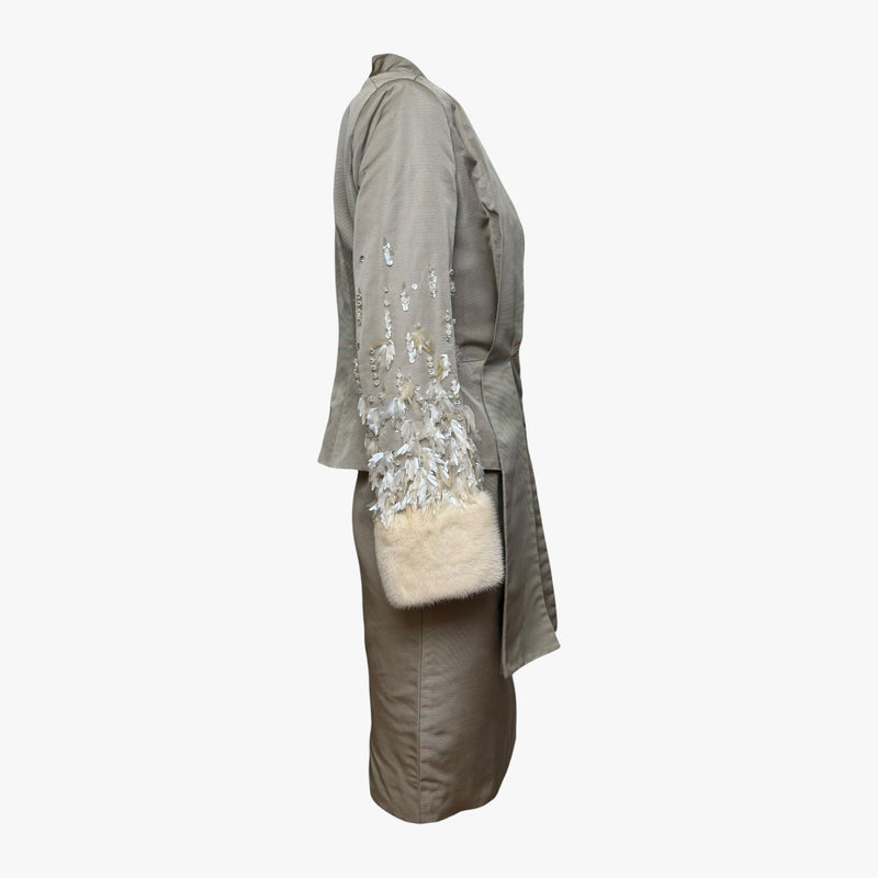 Christian Dior suit blazer, side profile showing hand-embellished sleeve and mink fur cuff detail