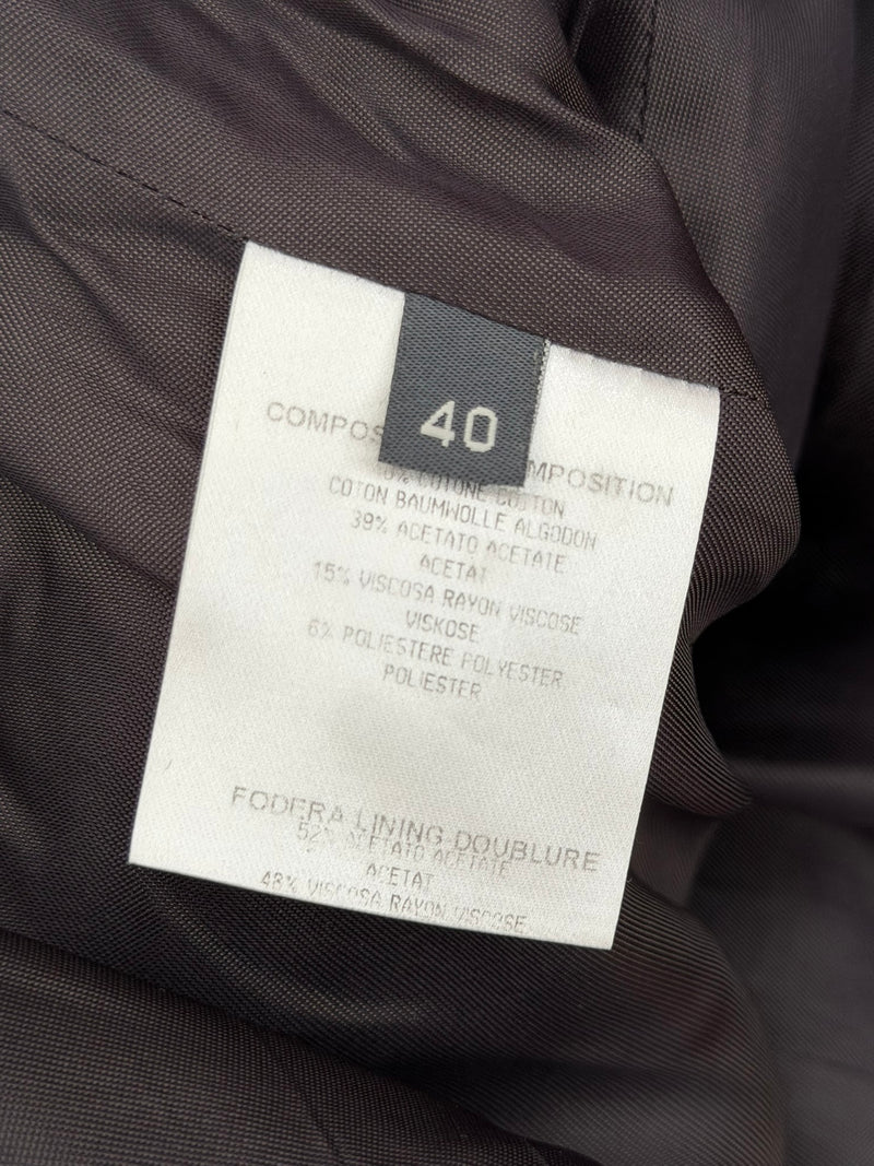 Silver metallic lamé dress by Alexander McQueen, back detail showing concealed zip closure