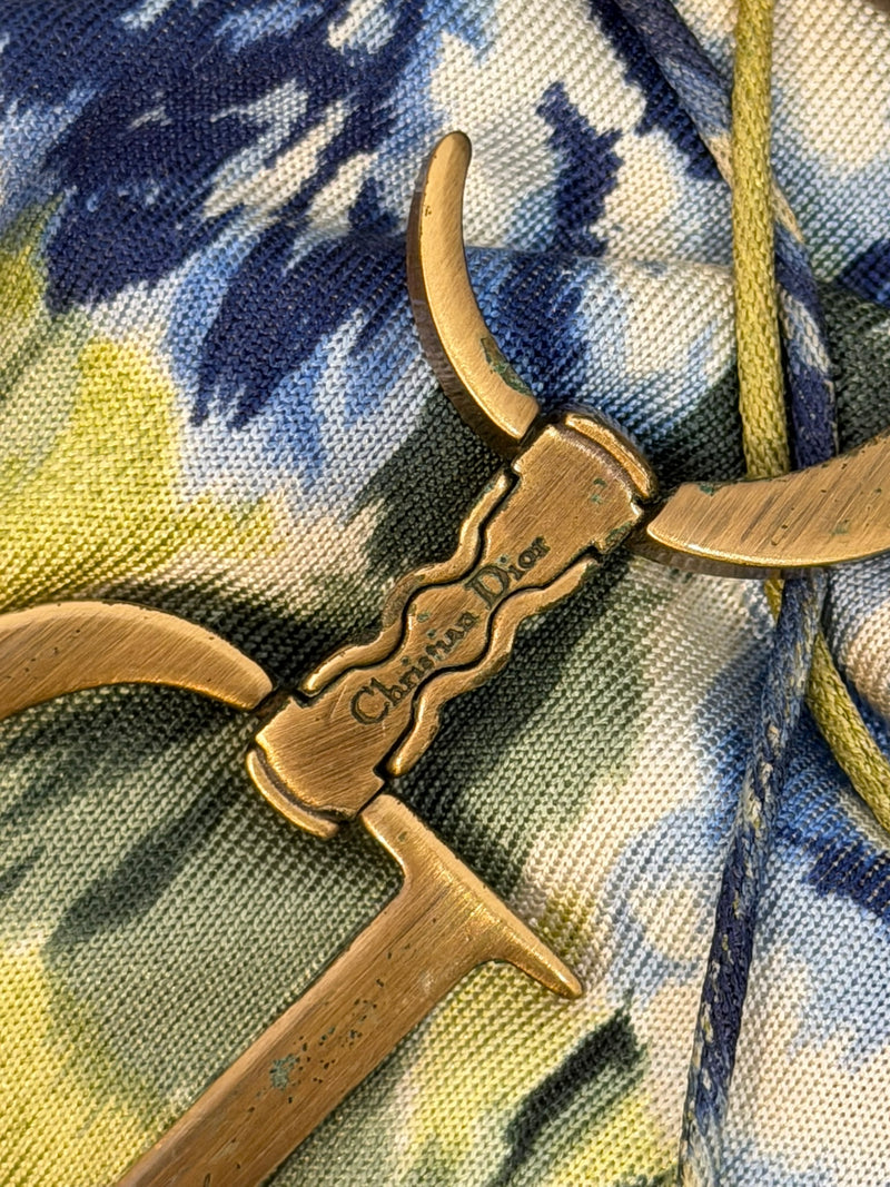 Full-length view of chartreuse slip dress, strategic hip ruching detail