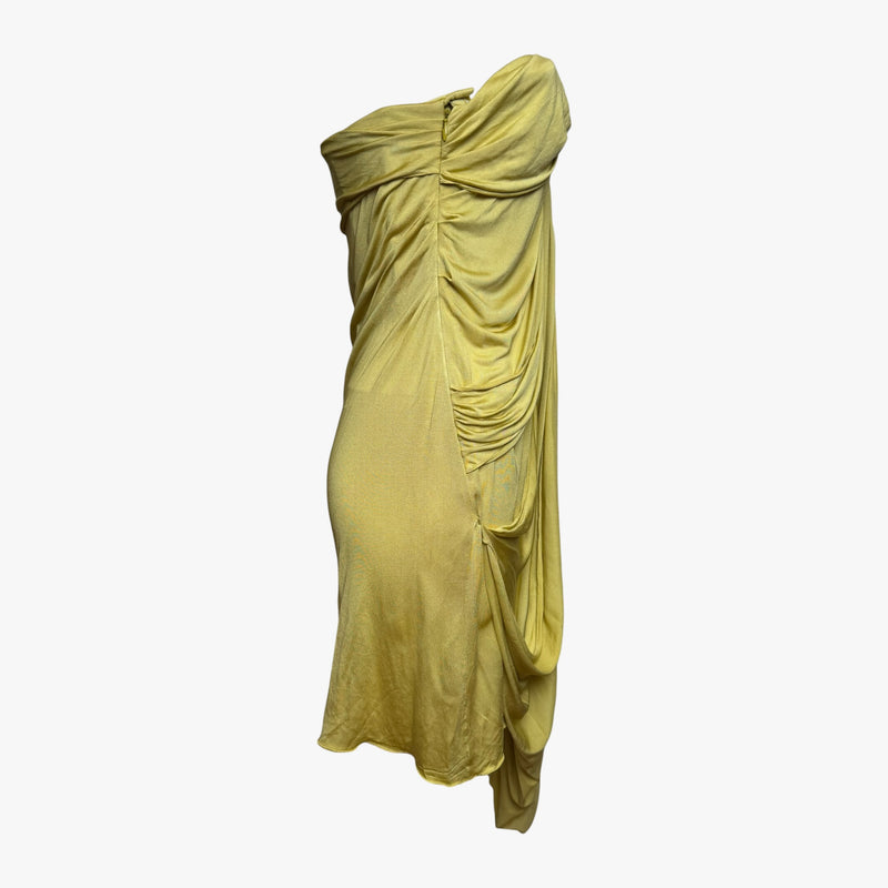 Yellow silk tulle dress by Christian Dior, side view showing asymmetric hemline and draping