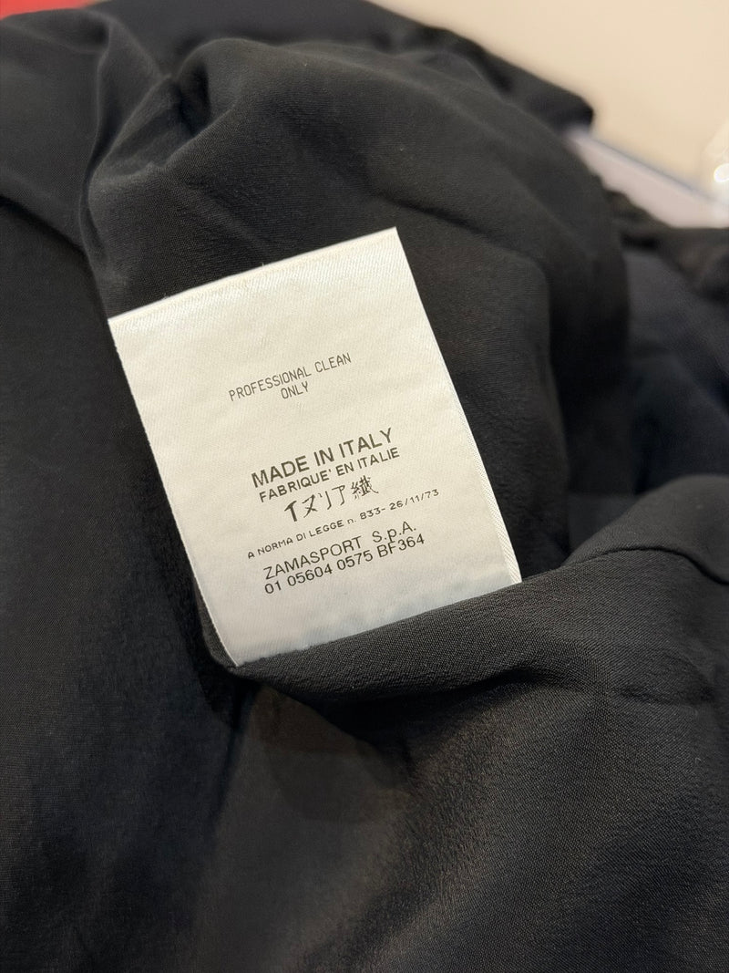Fendi blazer detail of welt pocket and astrakhan fur trim placement on silk garment
