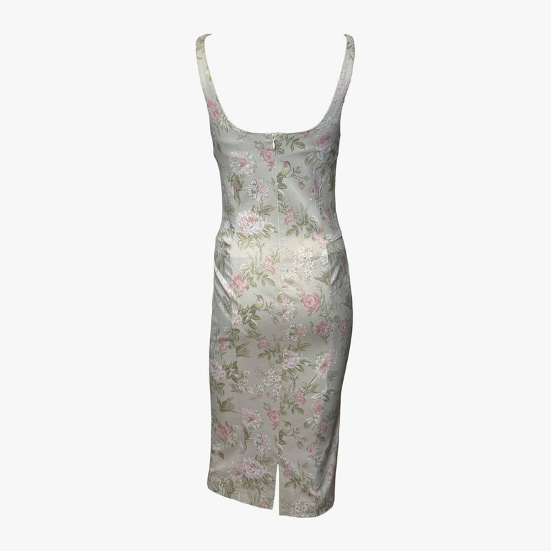 Detail of Dolce & Gabbana dress hem, mid-calf length with floral print on sage silk