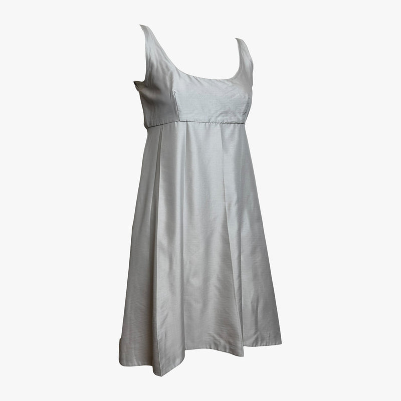 Pale grey silk empire waist dress by Prada, side profile showing A-line skirt