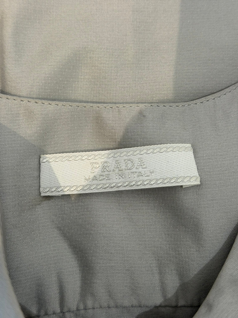 Pale grey silk empire waist dress by Prada, side zip closure detail