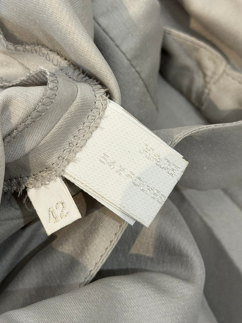 Pale grey silk empire waist dress by Prada, condition detail of neckline area