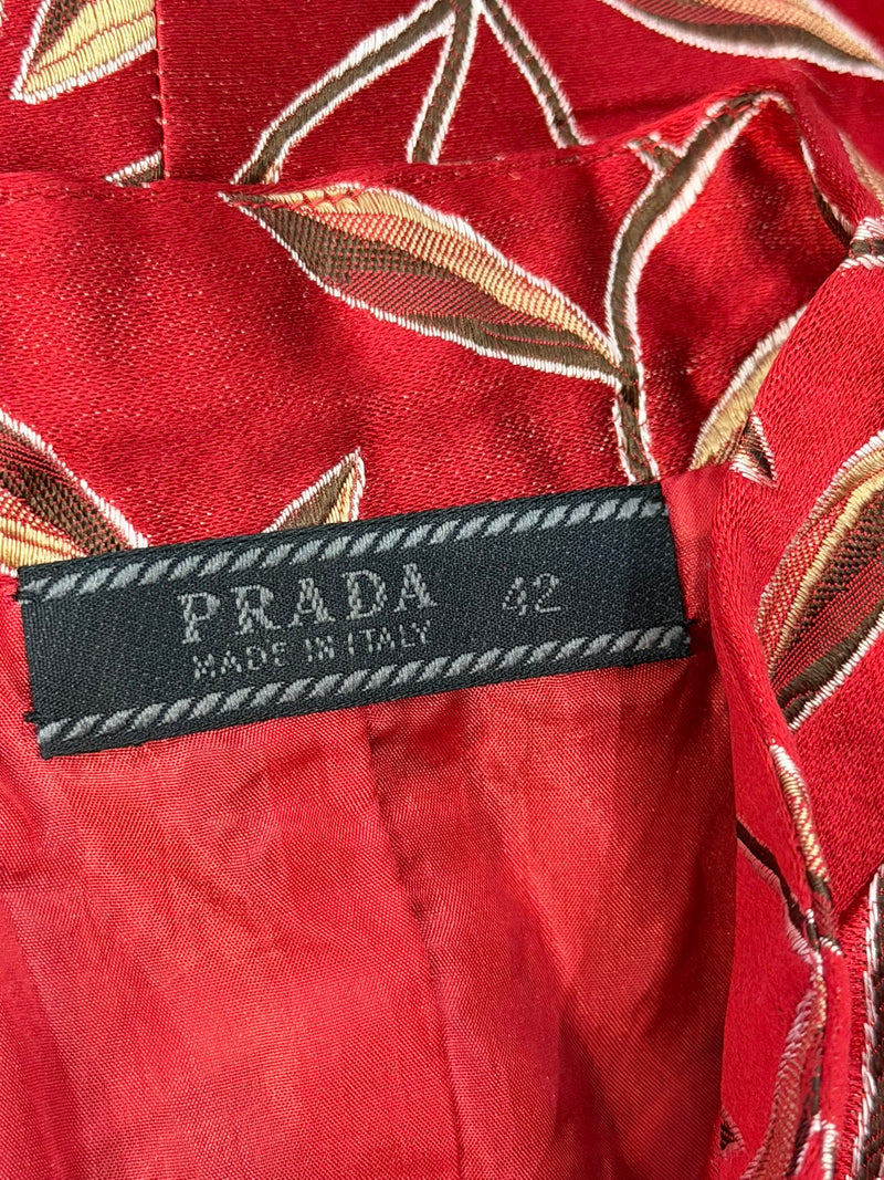 Deep red silk sleeveless top by Prada, botanical embroidery close-up