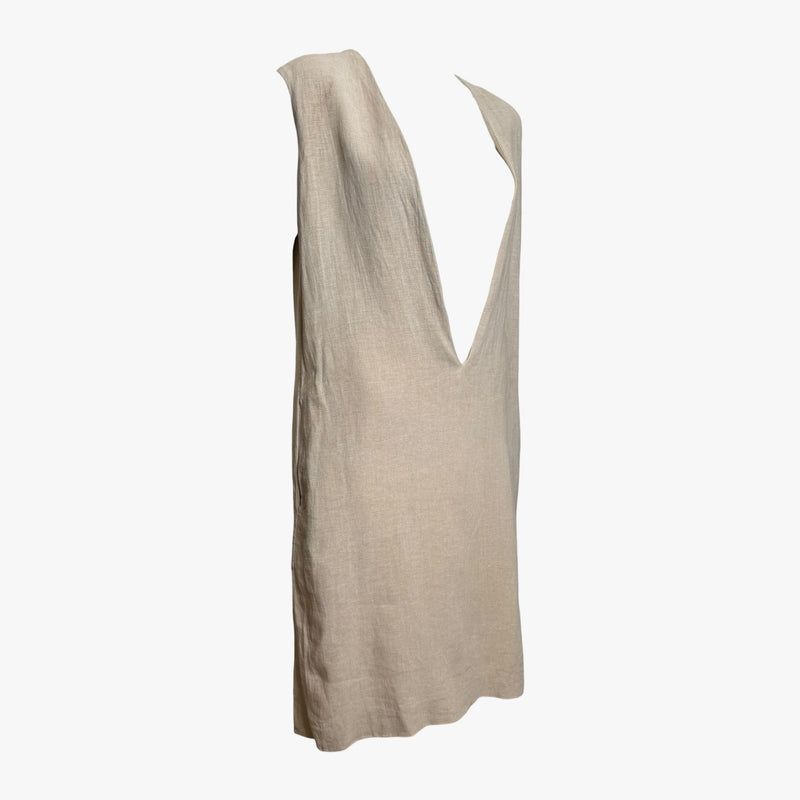 Beige linen V-neck dress, front view showing architectural neckline