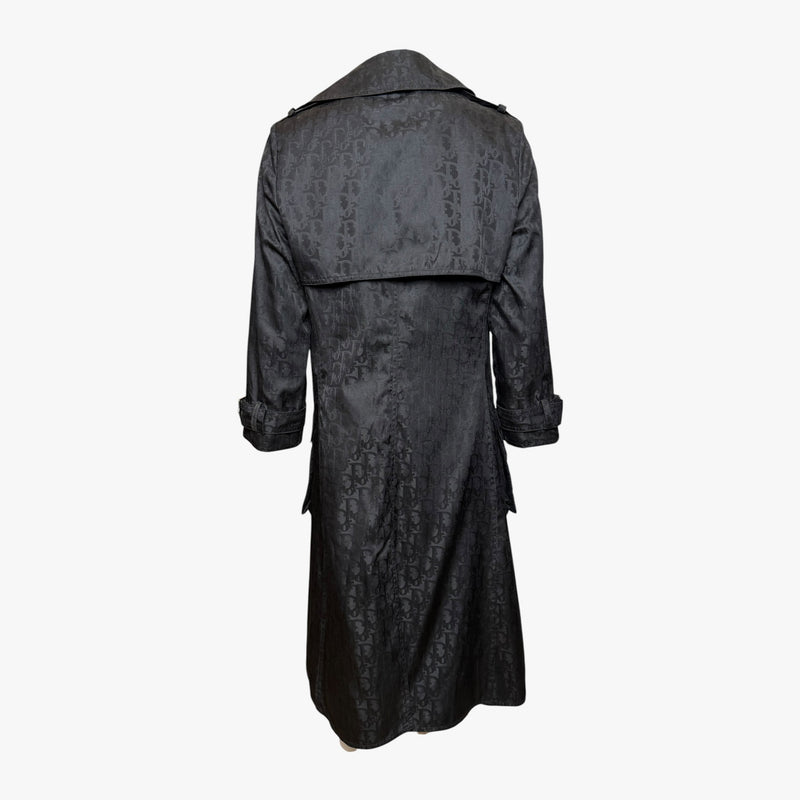Black monogram jacquard trench coat by Christian Dior, adjustable cuff tabs with buckles
