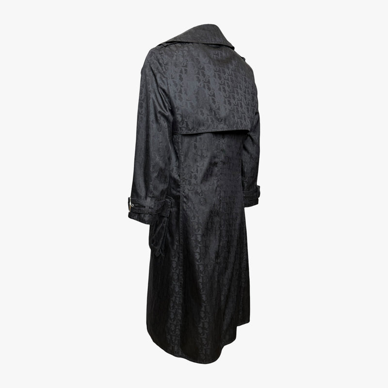 Black monogram jacquard trench coat by Christian Dior, fabric-covered button detail