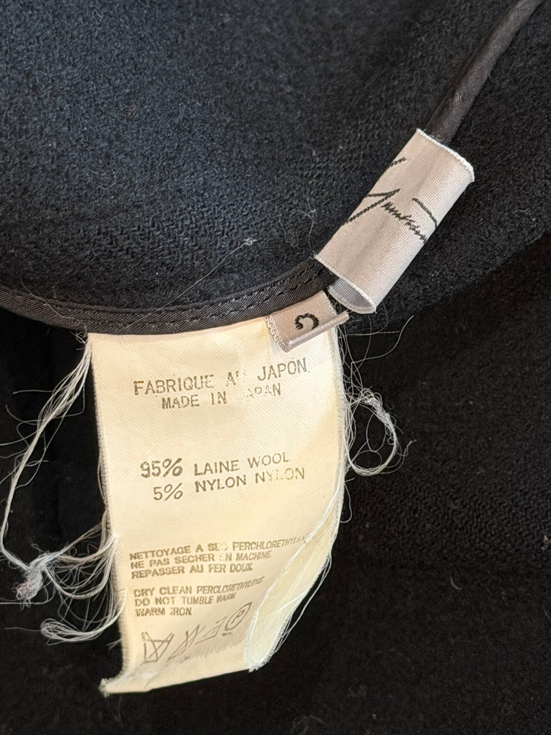 Charcoal grey wool trench coat by Yohji Yamamoto, fabric belt detail