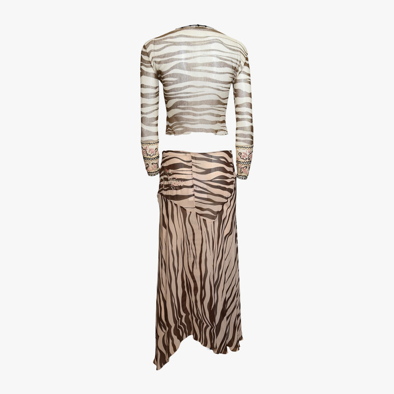 Asymmetric skirt side view showing bias-cut silhouette and irregular hemline