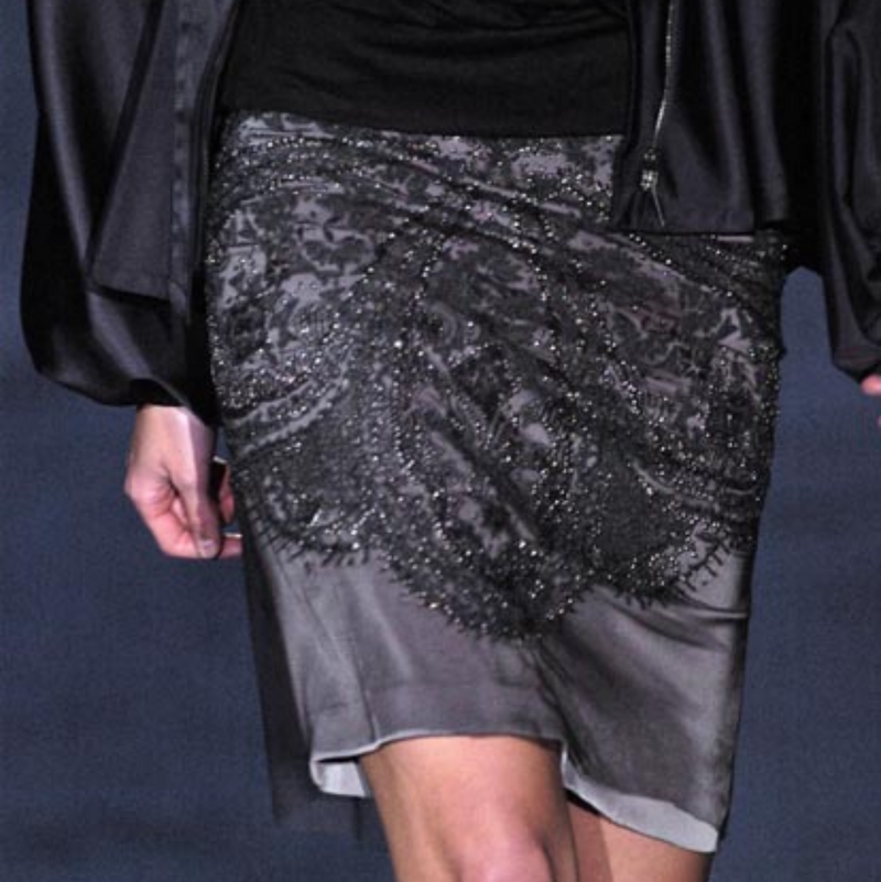 Charcoal grey beaded mesh pencil skirt by Gucci, flat lay showing total length and fit