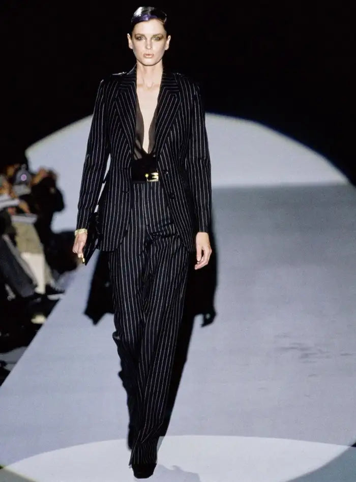 Navy pinstripe wool suit jacket by Gucci, structured shoulders and tailored silhouette