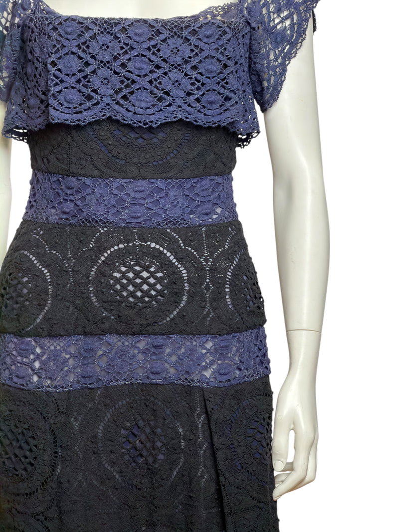Detail of alternating lace panels on skirt of Vivienne Westwood corseted dress