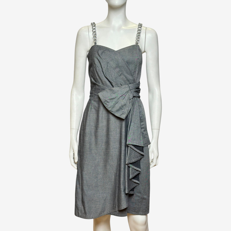 Gianni Versace dress front view displaying sweetheart bustline and crossover draping
