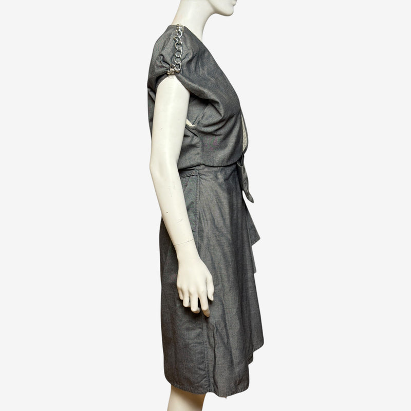 Gianni Versace dress side profile showing cascading ruffled trim and side tie belt