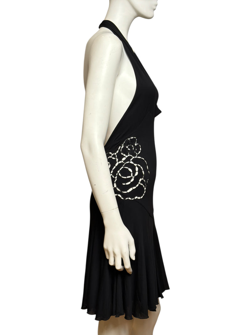 Black silk mini dress by Roberto Cavalli, back view of cutout design