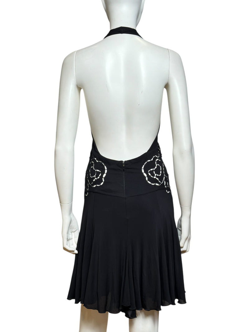 Black silk mini dress by Roberto Cavalli, close detail of cutout work