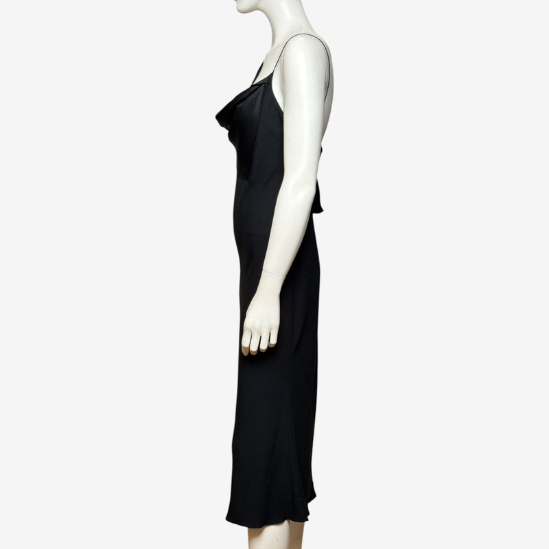 Black satin slip dress by John Galliano, detail of shoulder strap and cowl neckline