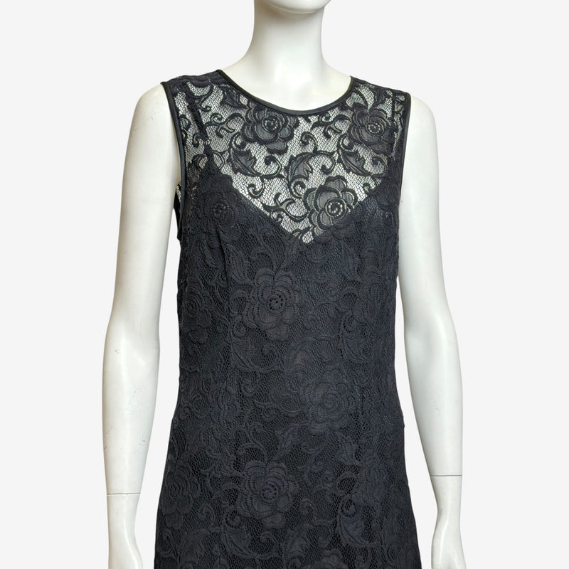 Black lace long gown by Dolce & Gabbana, front view of fitted bodice and fluid skirt