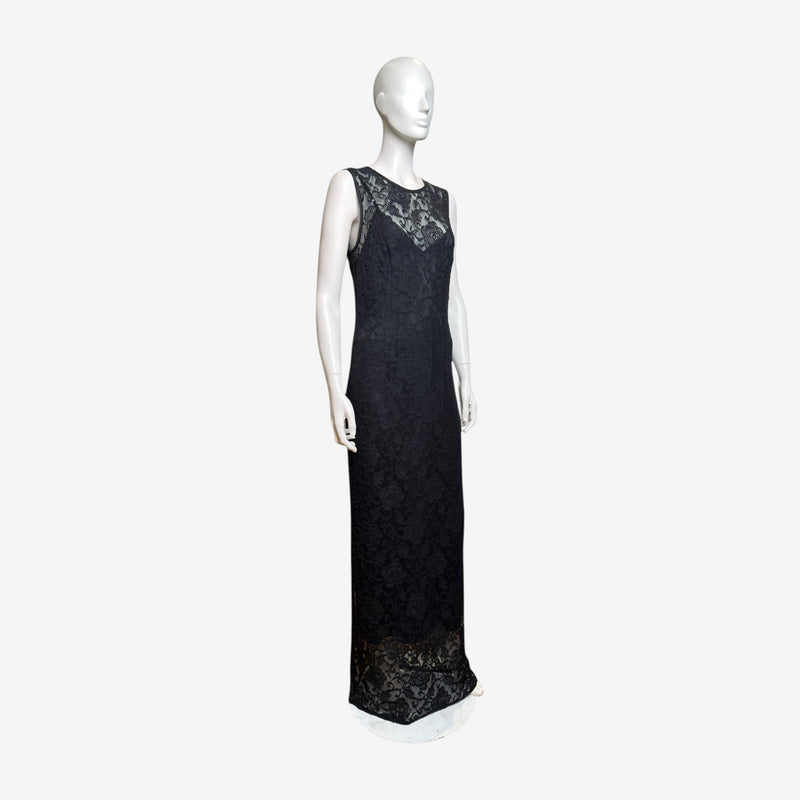 Black lace gown by Dolce & Gabbana, side profile showing fluid lace drape