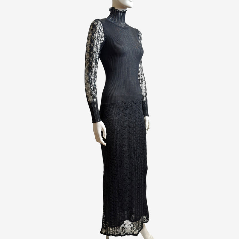 Black gown with diamond-pattern lace sleeves and ribbed knit bodice, side angle