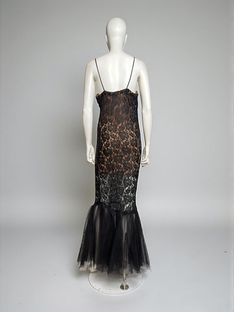 Detail of La Perla gown showing intricate black lace construction over nude base