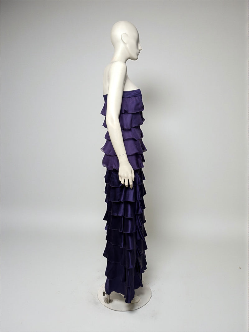 Purple silk satin gown by Valentino, side profile of cascading tiered ruffles and column silhouette