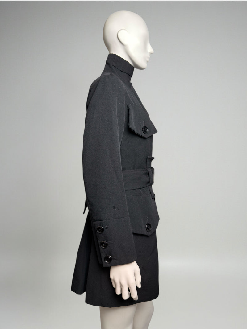 Black wool jacket by Yohji Yamamoto, side view showing misaligned chest pocket