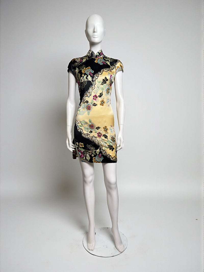 Yellow silk cheongsam mini dress by Roberto Cavalli, front view with decorative hooks