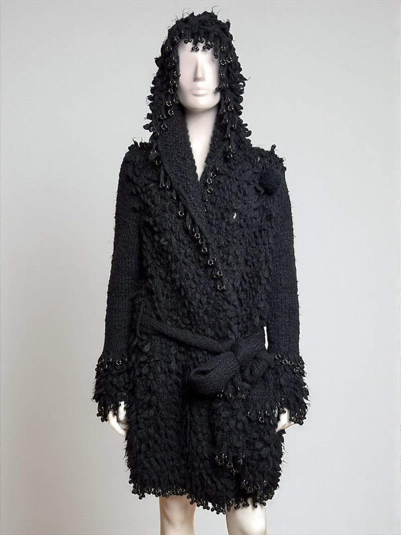 Black wool hooded coat by Paco Rabanne, Fall 2002 Piercing collection, front view