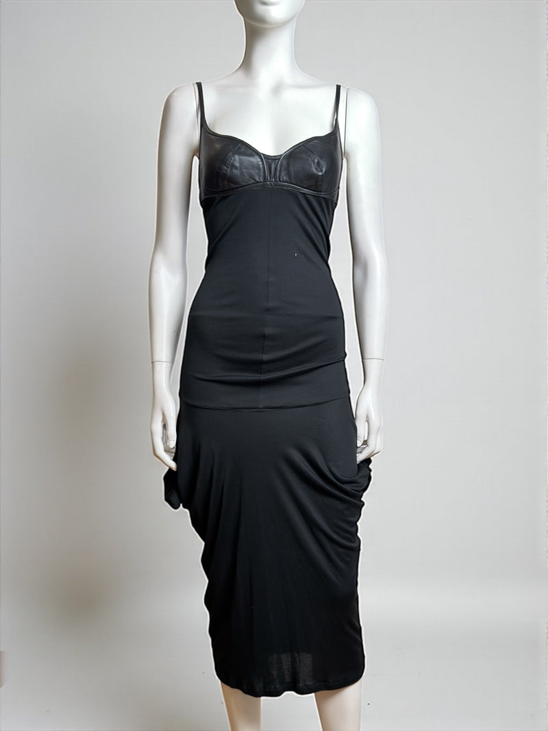 Black midi dress by Alexander McQueen with molded leather cups and draped back, front view