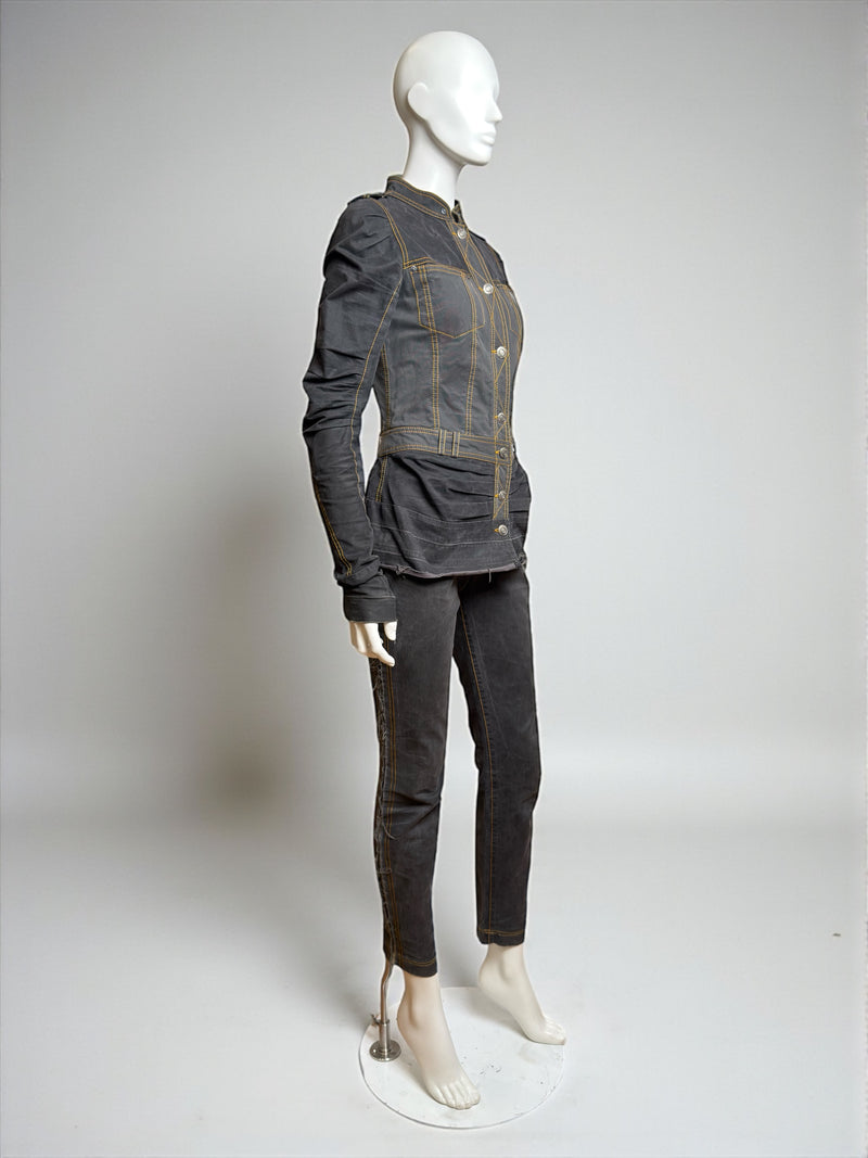 Slim-cut denim jeans by John Galliano with tulle trim along side seams, Spring 2006