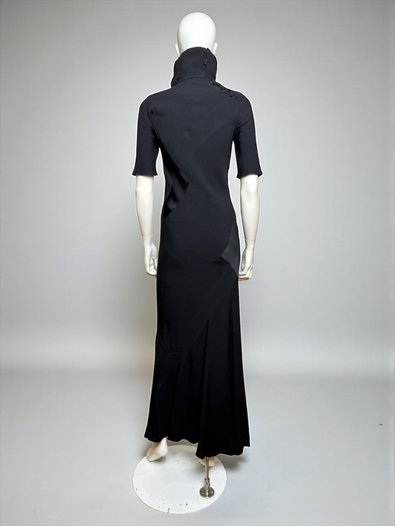 Black bias-cut evening gown by John Galliano, three-quarter length view of F/W 1989 piece