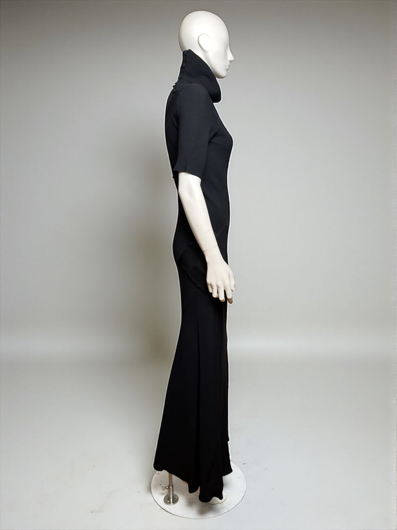 Black evening gown by John Galliano, detail of flared hem and bias-cut draping