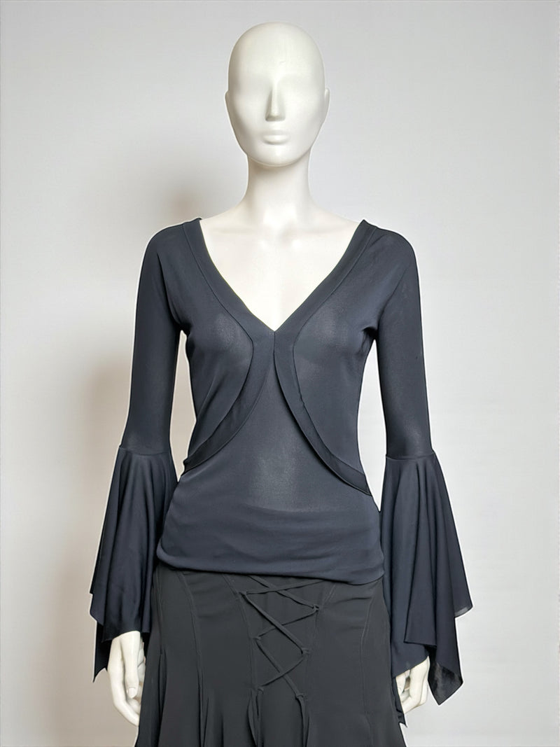 Black jersey top and tiered chiffon skirt by Yves Saint Laurent, Tom Ford era, side profile