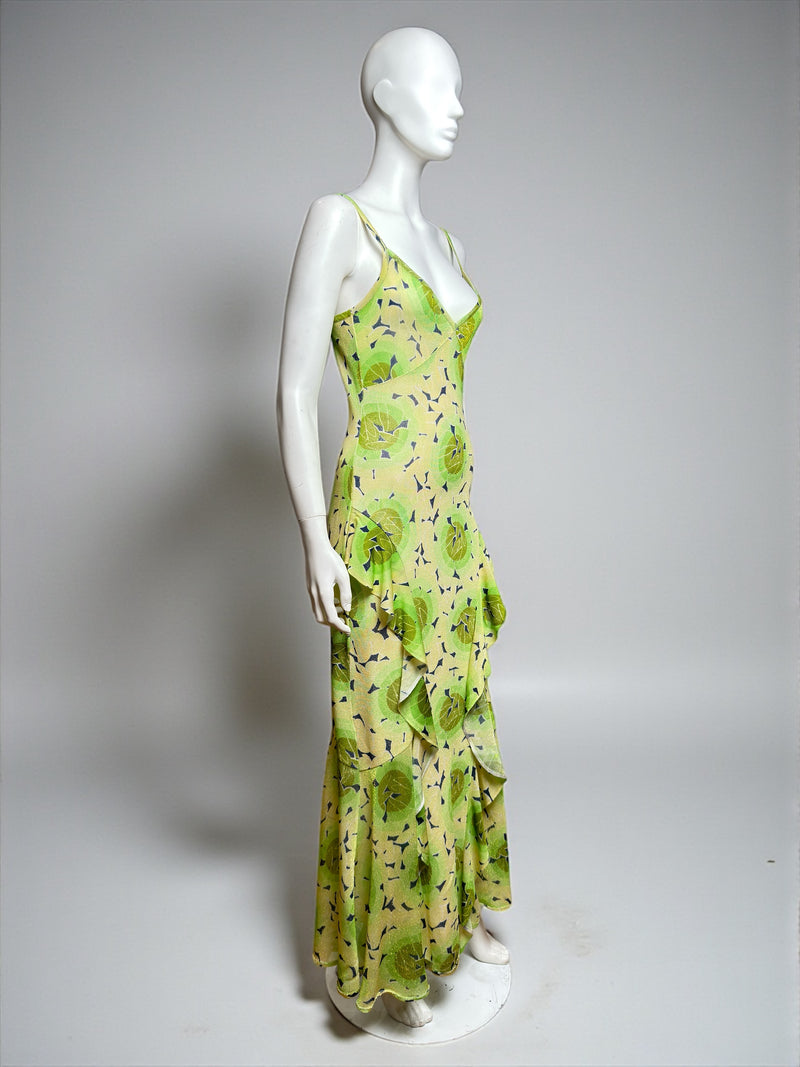Green printed viscose jersey dress detail highlighting slim straps and curved neckline