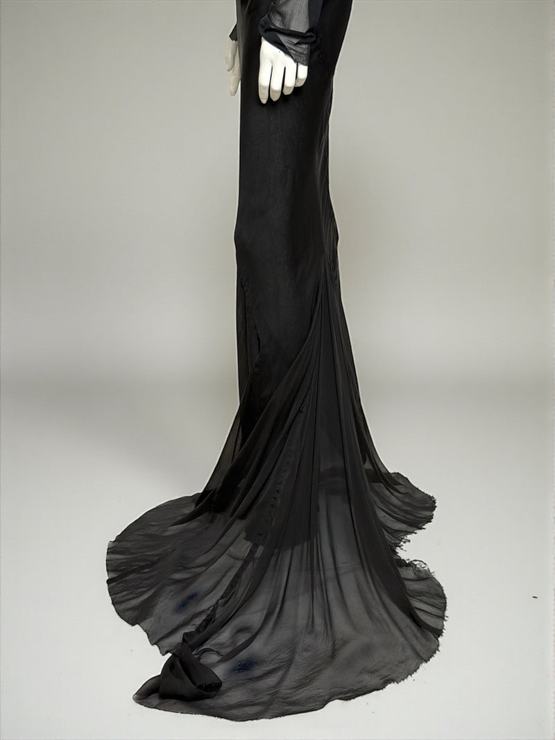 Black silk gown by Rick Owens, mermaid silhouette with elongated train and sculptural draping