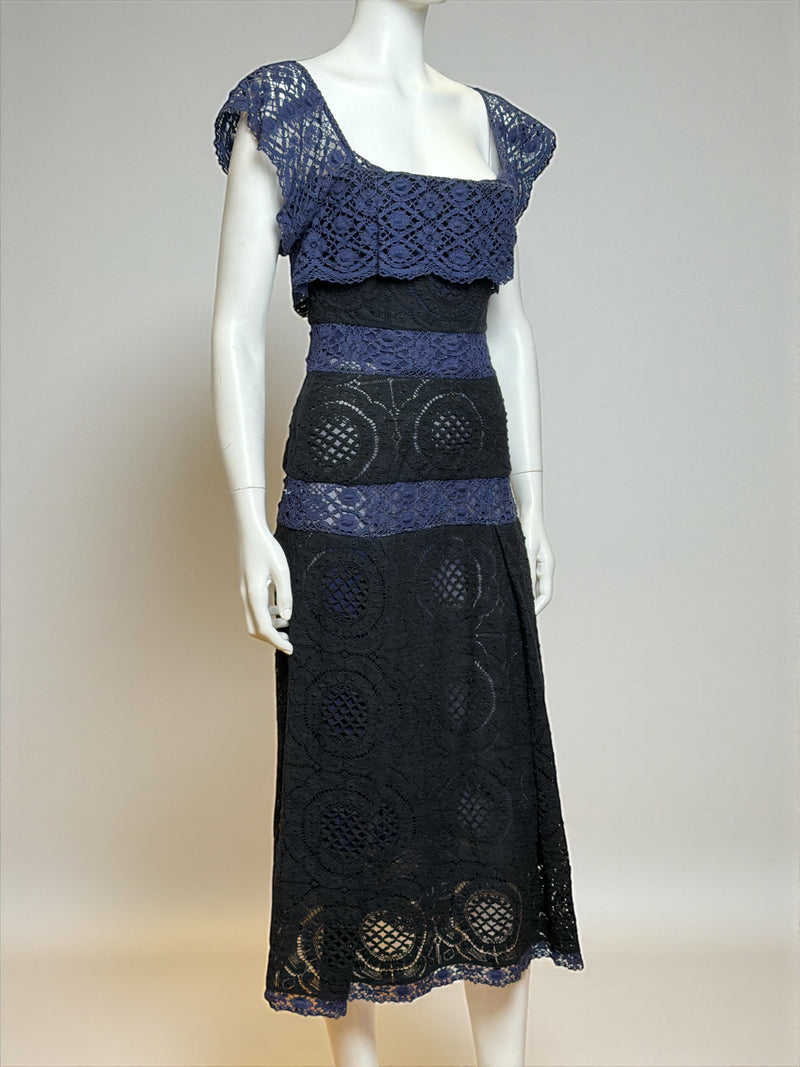 Front detail of Vivienne Westwood lace dress with square neckline and built-in corset boning