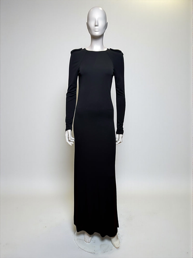 Black evening dress by Gucci Tom Ford, full length view showing fluid fabric and back opening