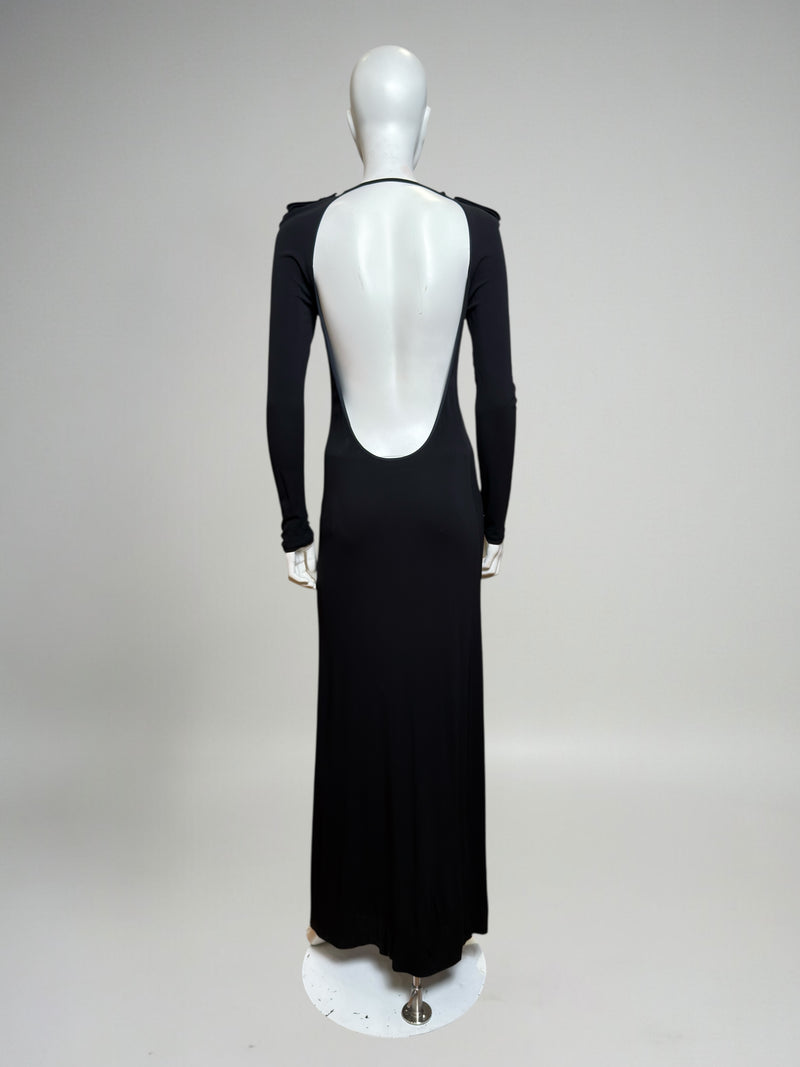 Black backless evening dress by Gucci Tom Ford, floor-length with long sleeves and open back detail