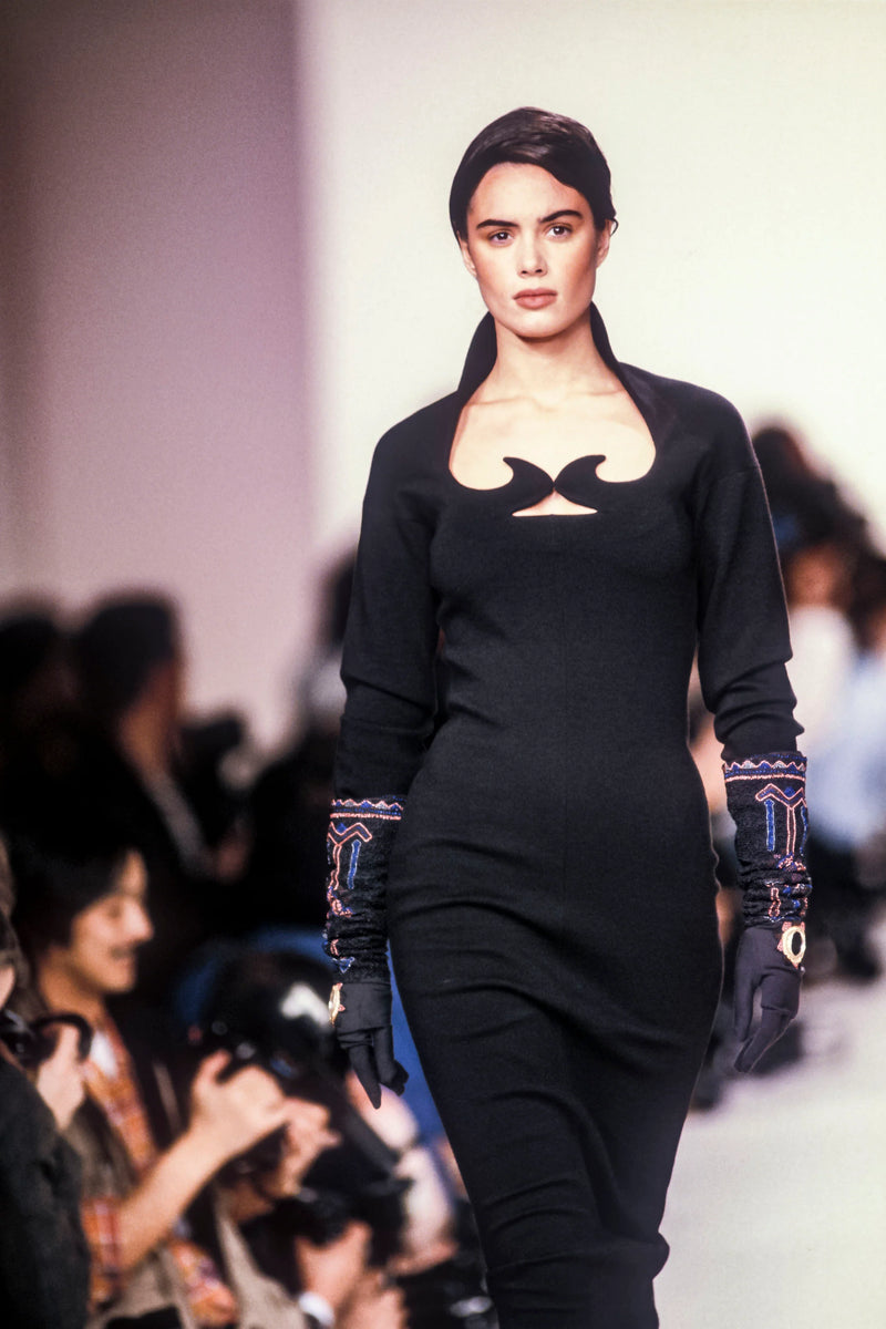 Romeo Gigli F/W 1990 runway presentation of black wool jersey cutout dress