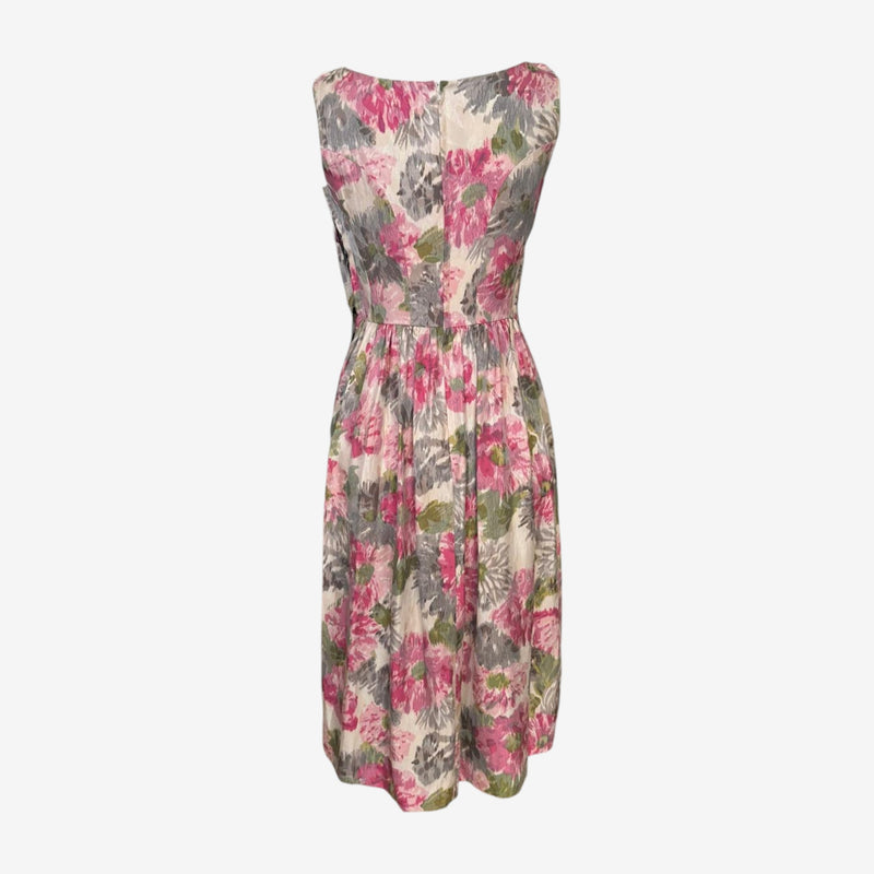 Layered dress by Comme des Garçons, cream botanical print with grey and green tones under black mesh