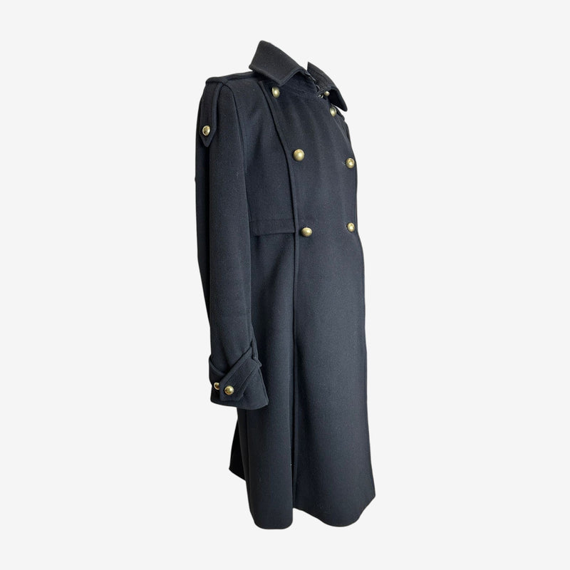 Navy YSL military coat, back view displaying structured shoulders and mid-calf length