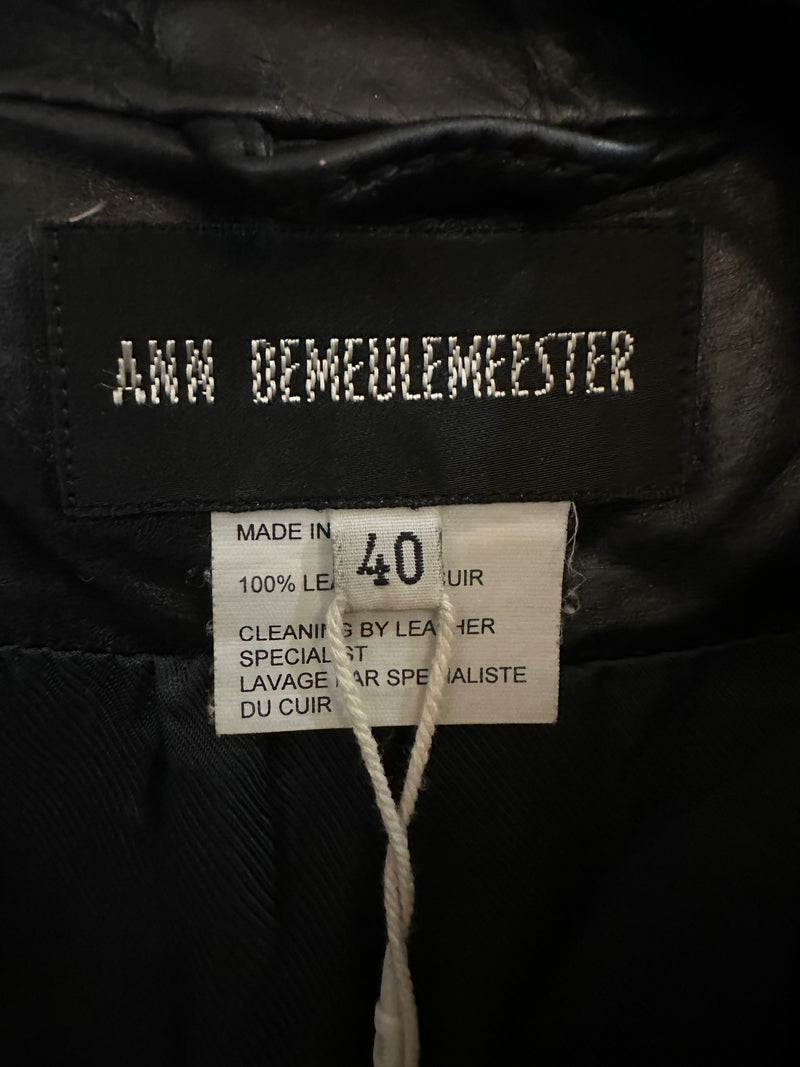 Ann Demeulemeester black leather jacket, detail of high funnel neck and shoulder seaming