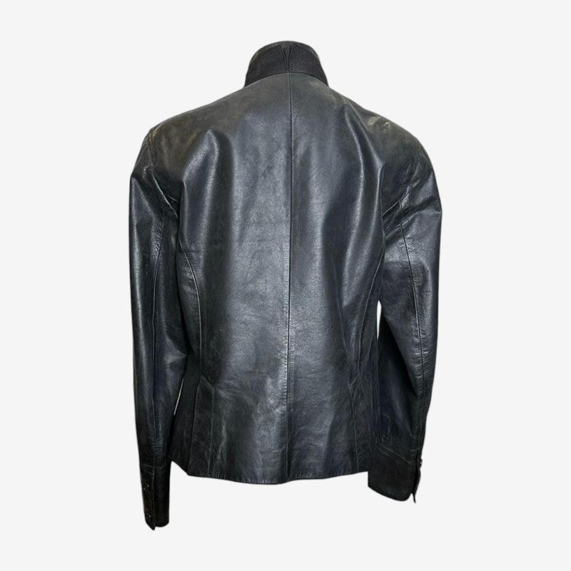Black leather jacket by Ann Demeulemeester, curved hemline and precise seaming detail